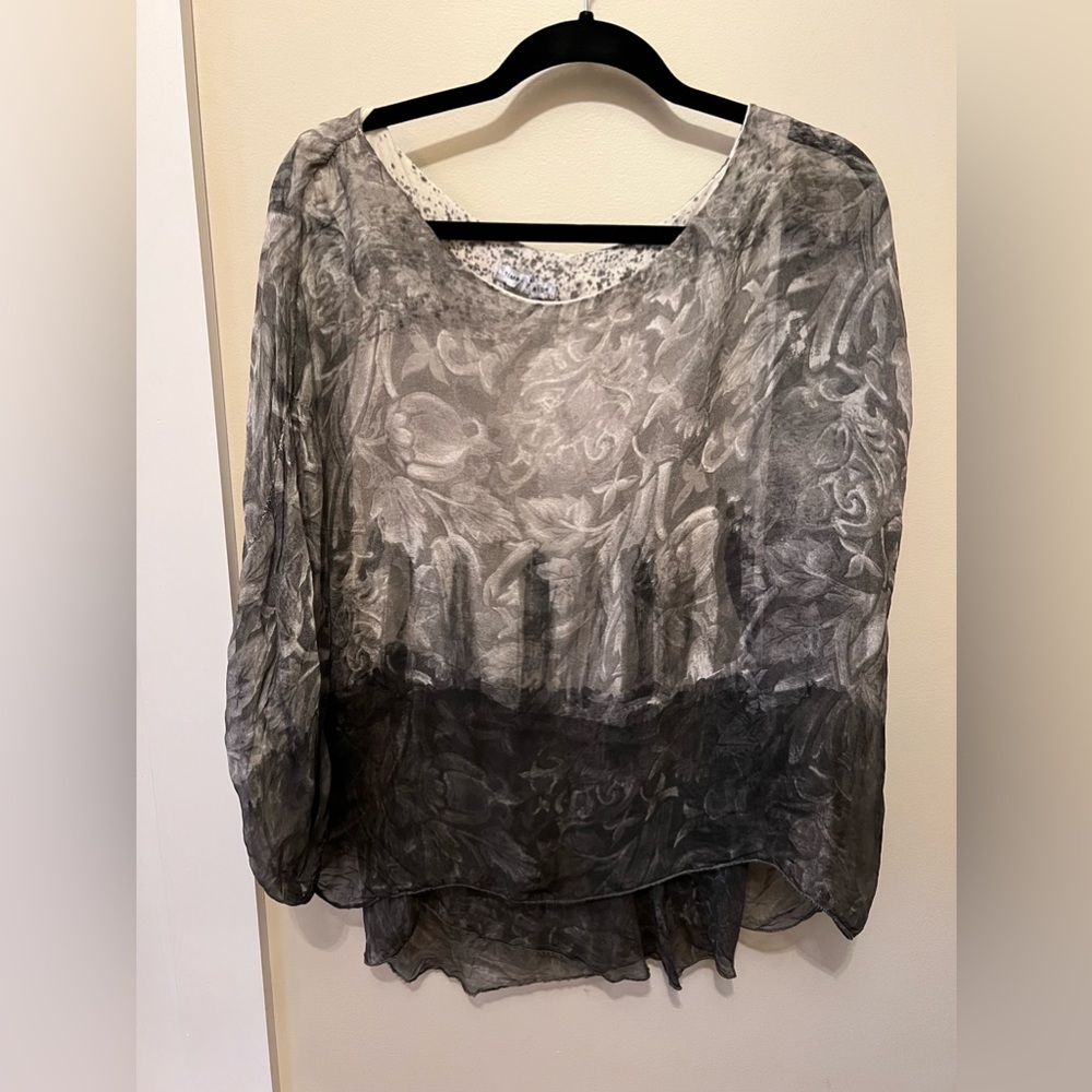Sheer party blouse bought from high end boutique. Gently used.